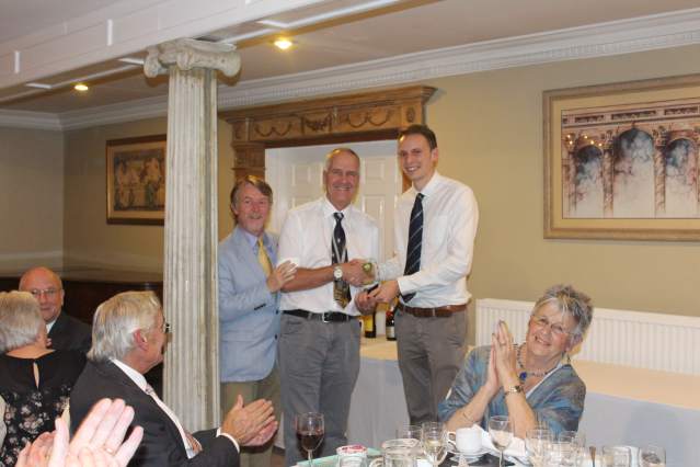 Image of Keith Jenner being presented with the chairmans award for services to the club